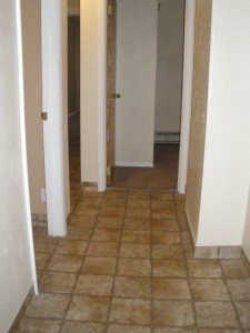 Hallway from MBd-- Bath left, LR, right, Sm BDr ahead. Med Bdr ahead to left, Kitchen /Dining beyond LR to right