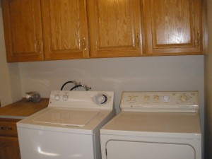 Washer/Dryer included plus lots of Oak Cabinetry